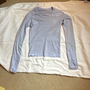 Lululemon Swiftly Tech 2.0. Race length. Size 2. Color: light periwinkle